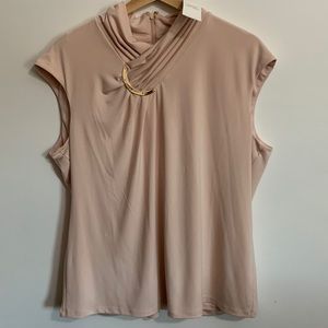 Perfect for work Calvin Klein top! The color is blush!